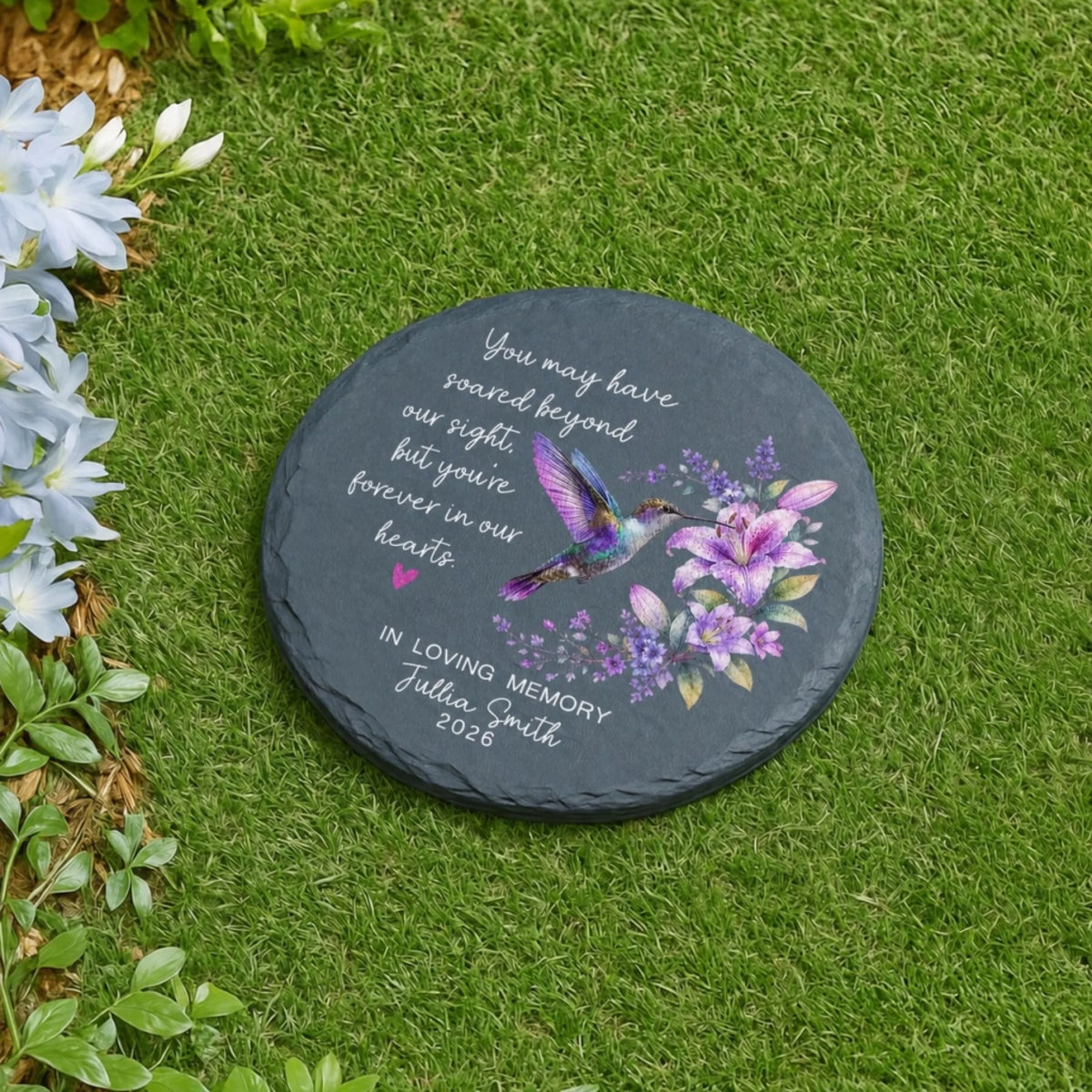 Hummingbird memorial garden stone on lawn
