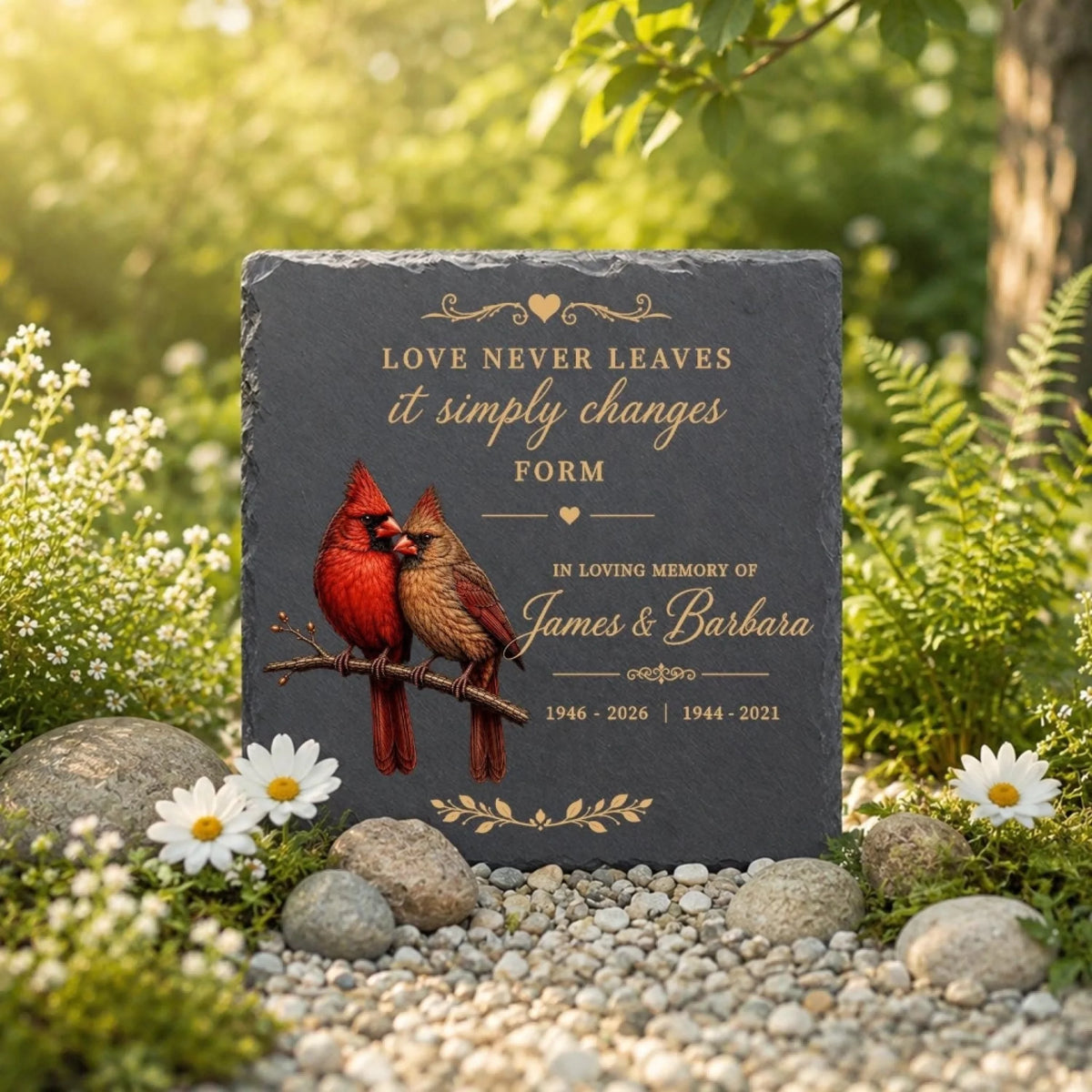 Square cardinal memorial stone with custom names and years in garden