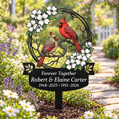 Cardinal and dogwood memorial garden stake by stone path